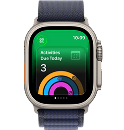 Liquid Glass design on the Bigin app across iPhone, iPad, and Mac devices.