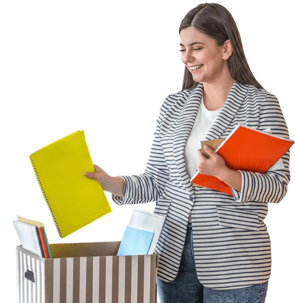 Trainer holding books and folders